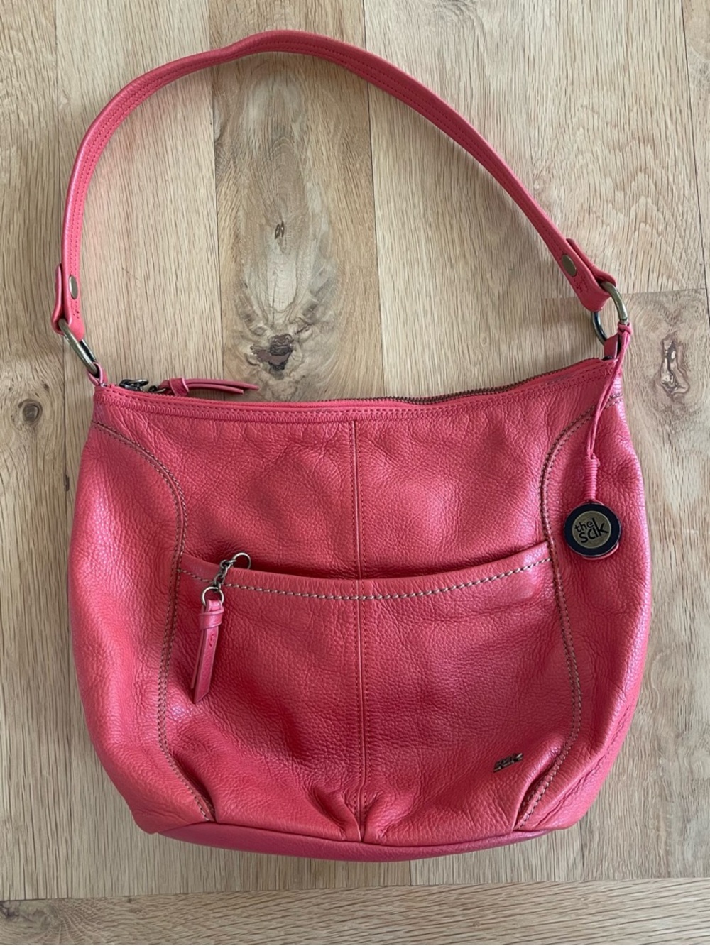 The Sak Coral Orange Pebbled Leather Shoulder Bag